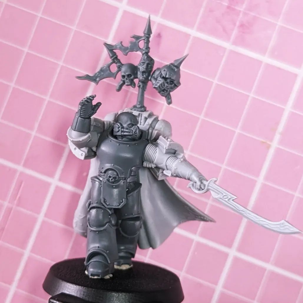 Emperors Children Chosen Champion a Palatine Blade Duellist / Prefector armed with a charnabal sabre created from the MkIII Horus Heresy Legionary Tactical Sergeant and the Captain Lucius Sculpt