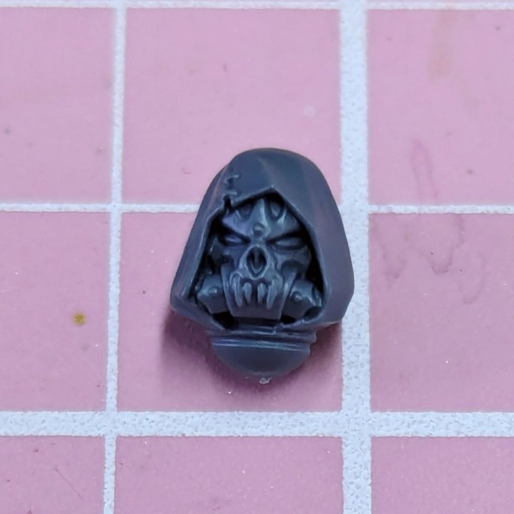 Shrouded helm with a hood belonging to a Chaos Space Marine Legionary taken from the Night Lords Nemesis Claw sprue